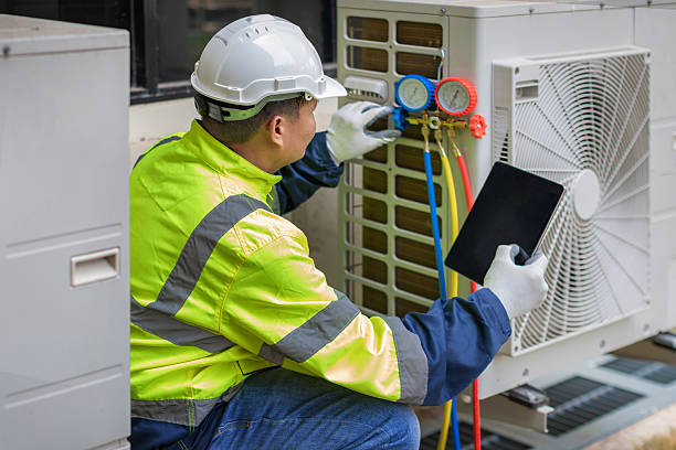 Professional Heat Pump Repair technician working in Ozone Park, NY